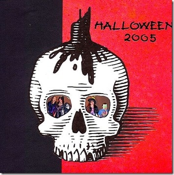 Halloween scrapbook page in red, black, and white with a skull