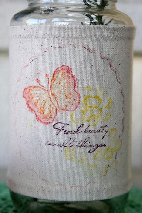 A design added to a canvas vase cover using Faber Castell mixed media products.