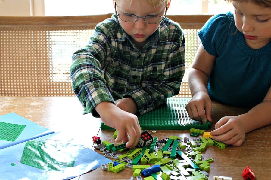 kids building the lego minotaurus game