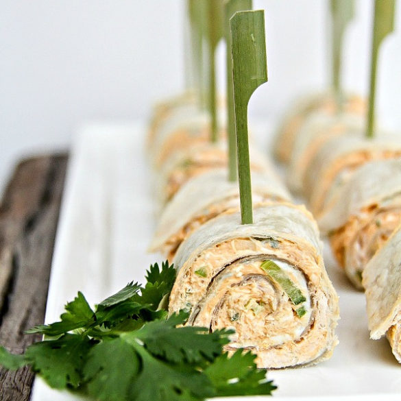 buffalo chicken salad pinwheels on a white tray