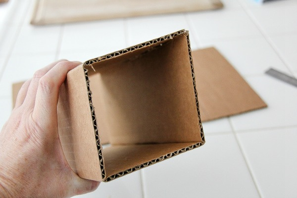 a box folded into a tunnel