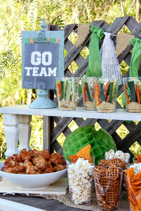 assorted foods set up for a football party