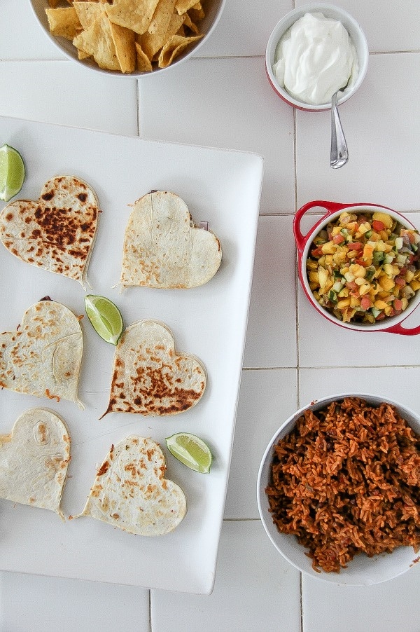 heart shaped quesadillas with rice, salsa and corn chips