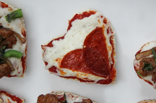 a heart shaped pepperoni pizza