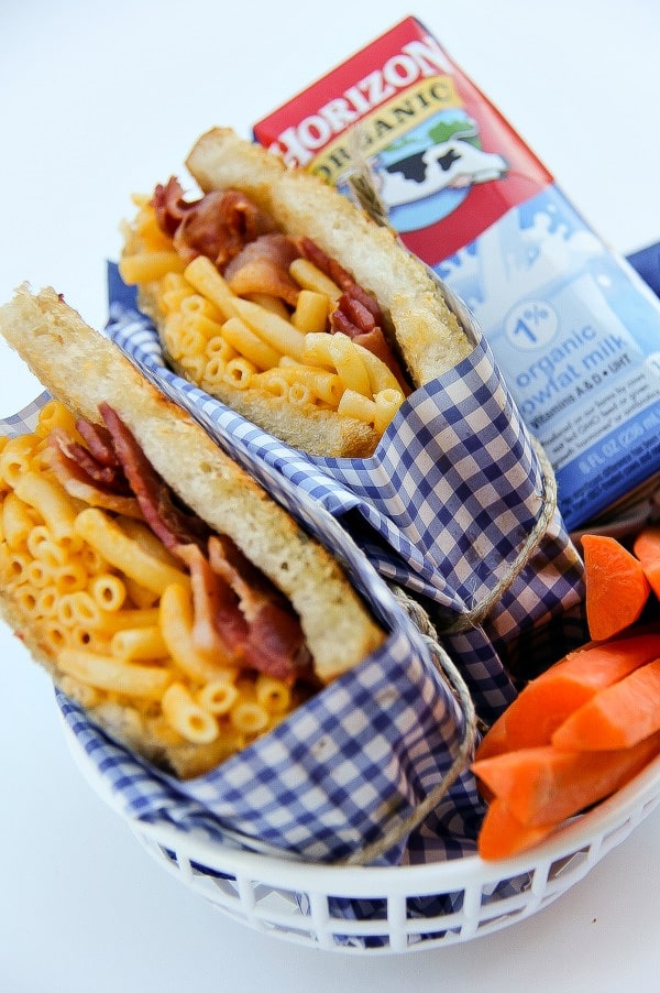 bacon mac & cheese sandwiches, milk box, and carrots in a food container