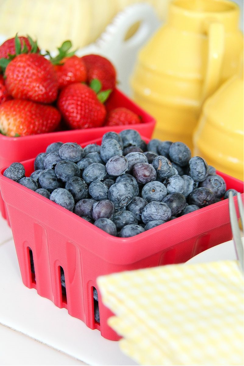 fresh blueberries and strawberries in punnets