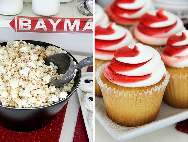 popcorn in a black bowl and red and white frosted cupcakes