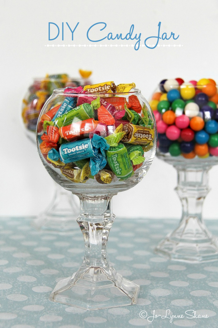 glass pedestal candy jar filled with candy