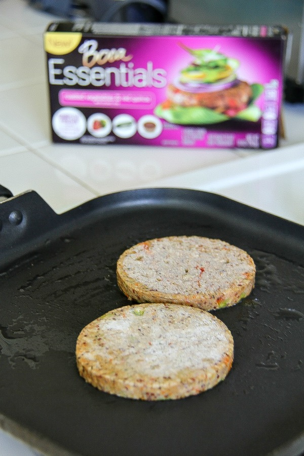 boca vegetable patties cooking on a skillet on the stove