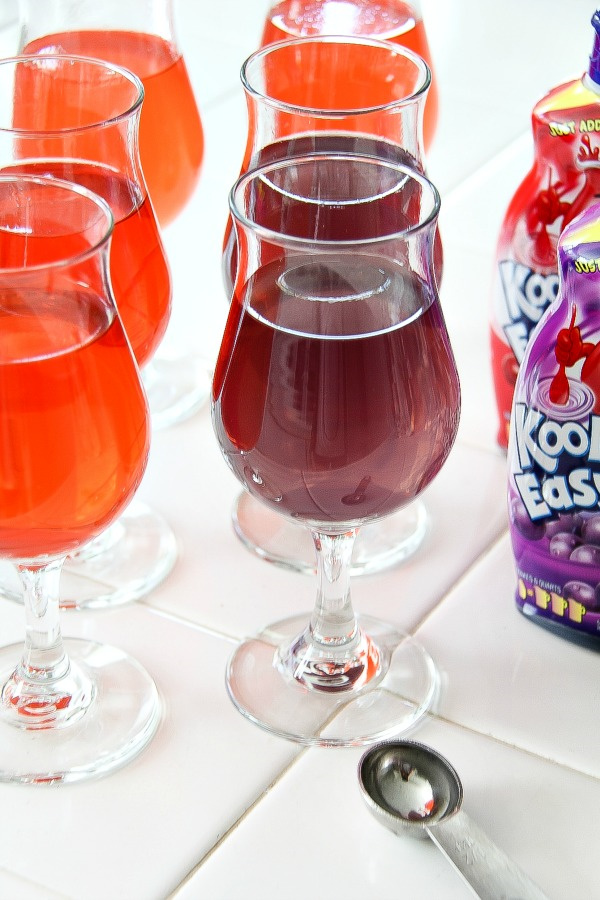 grape and cherry kool aid in glasses