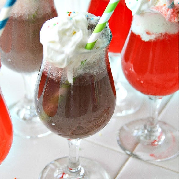 ice cream floats in a glasses with paper straws