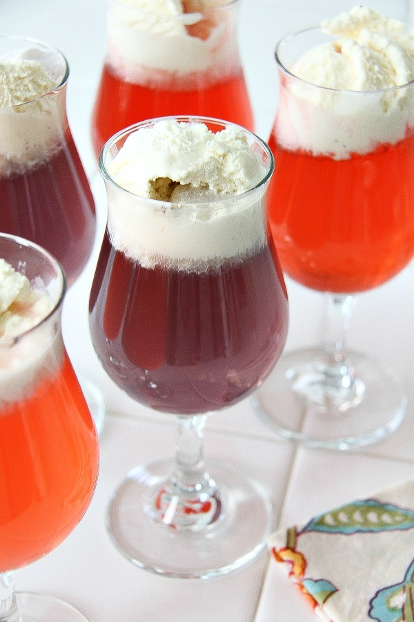 kool aid in a glass topped with ice cream