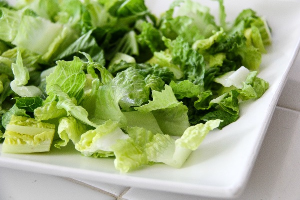 lettuce on a white serving tray