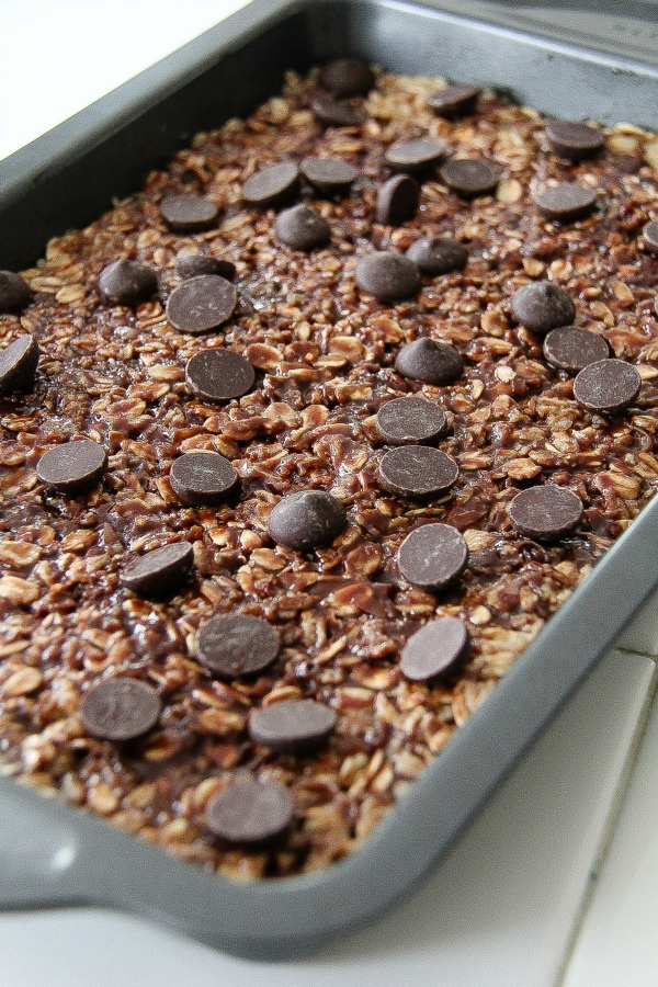 oat and chocolate chip mixture pressed into a baking pan