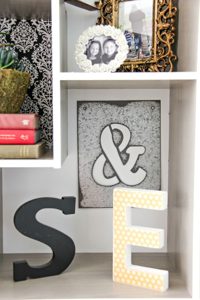 square shelving with wood letters