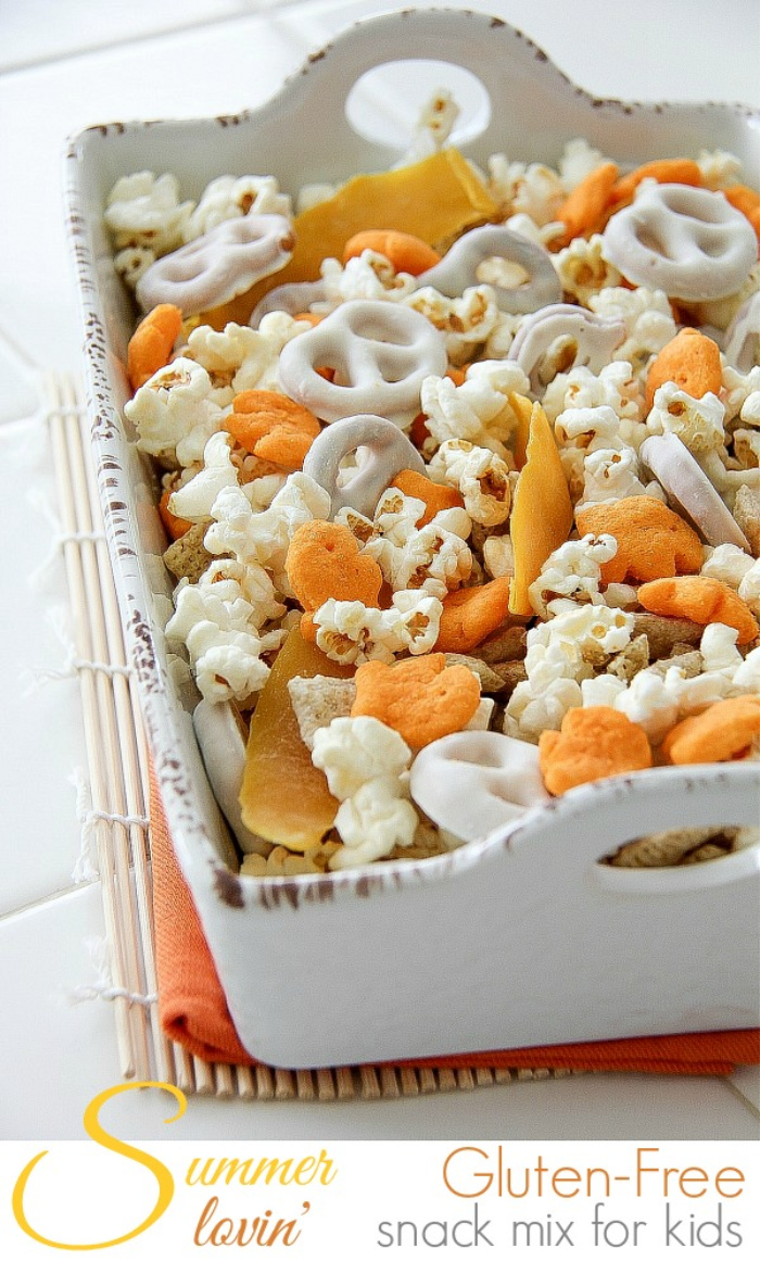 yellow orange and white gluten-free snacks in a white ceramic bowl