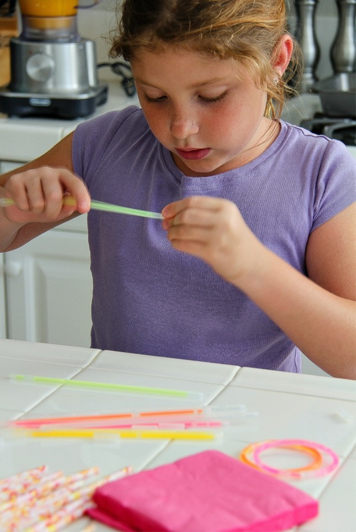 reusing old glow in the dark bracelets for a craft