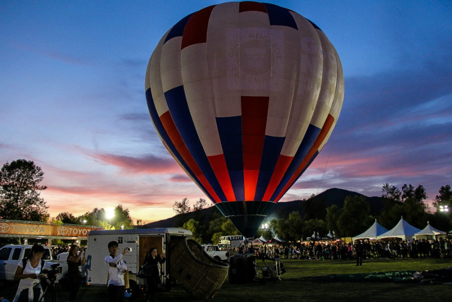 hot air balloon inflated at sunset