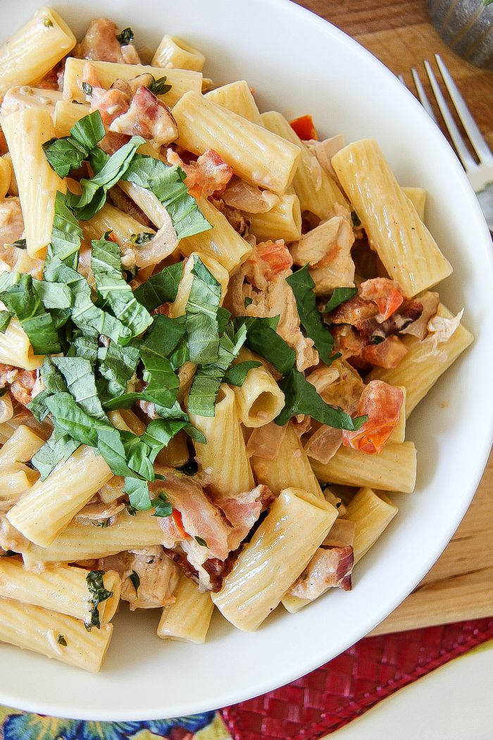 rigatoni pasta with bacon, chicken, tomatoes and basil