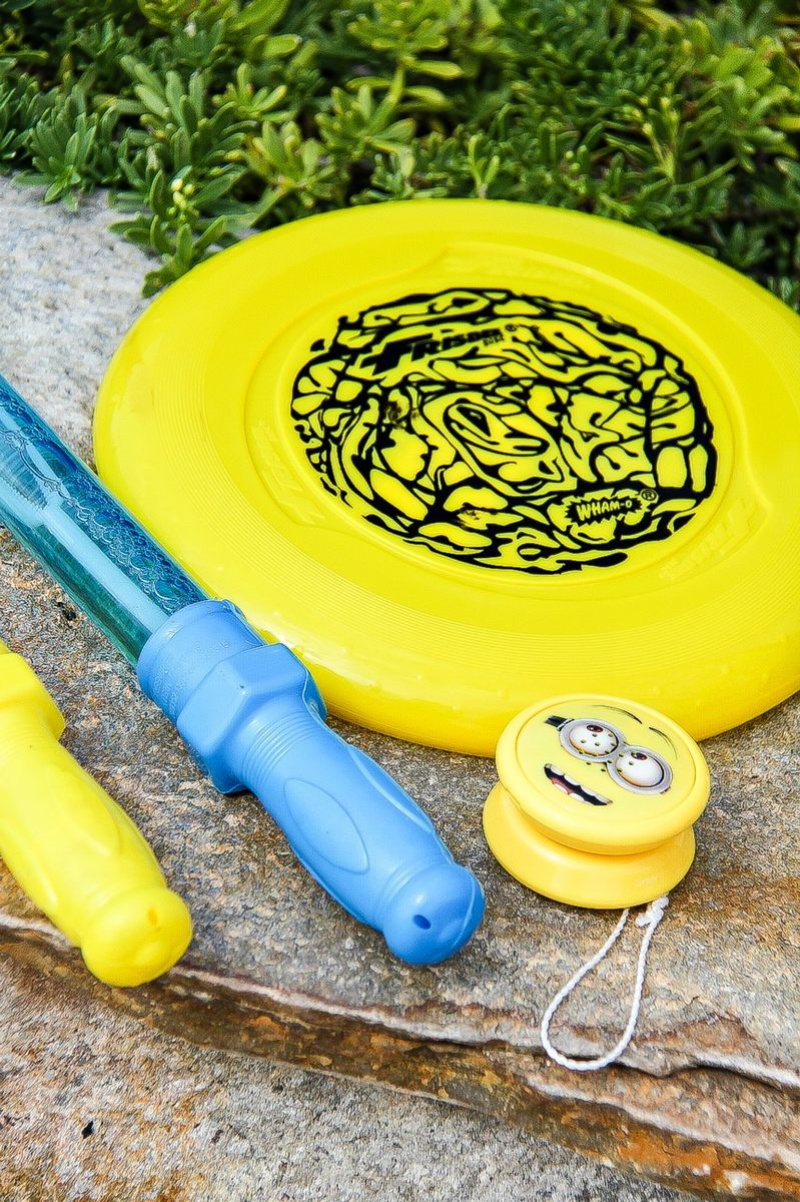 yellow and blue frisbee, bubble wands, and yo-yo's