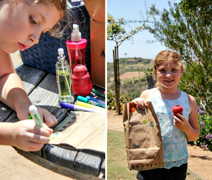 girl making a treat bag for foxes