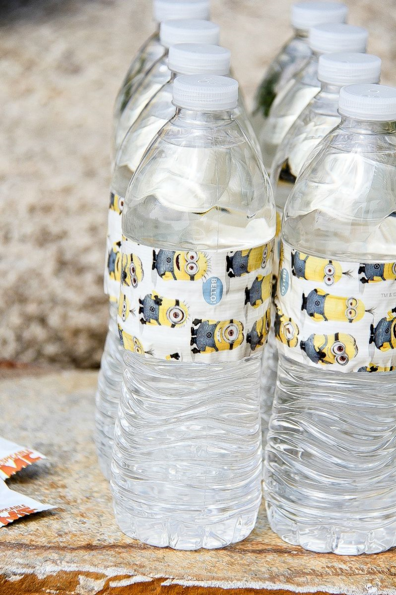 water bottles with minions tape wrapped around them