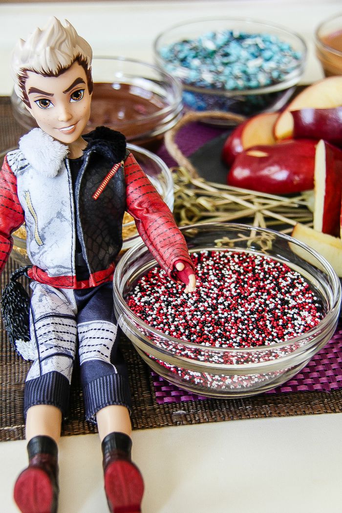 carlos descendants doll with red, black, and white sprinkles mix