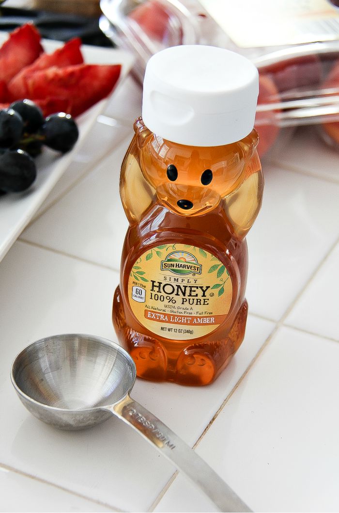 sun harvest honey shaped like a bear