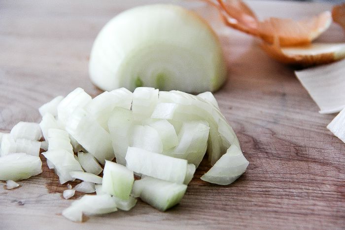 diced onion on a cutting board
