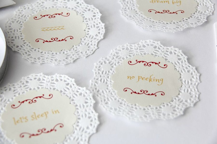 labels attached to lace doilies