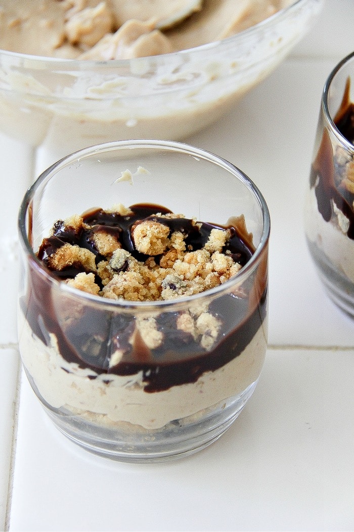 crushed cookies and chocolate sauce in a glass