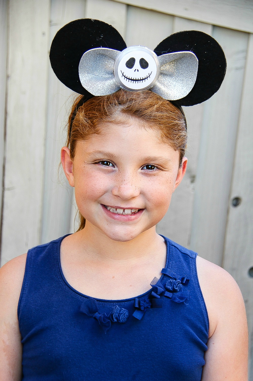 girl wearing a handmade jack skellington nightmare before christmas mickey ears headband