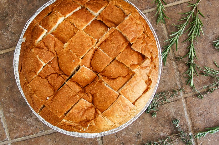 round bread in foil dish cut into squares