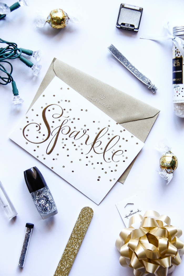 sparkle greeting card surrounded by stocking stuffer ideas