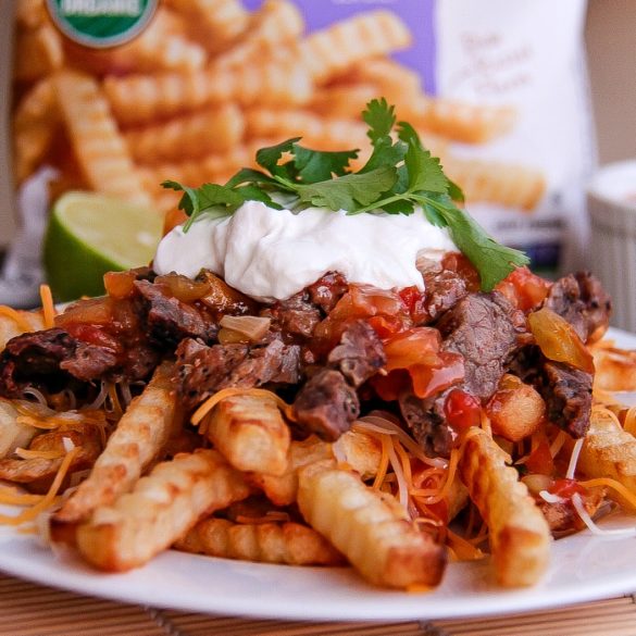 carne asada fries with a bag of alexia fries in the background