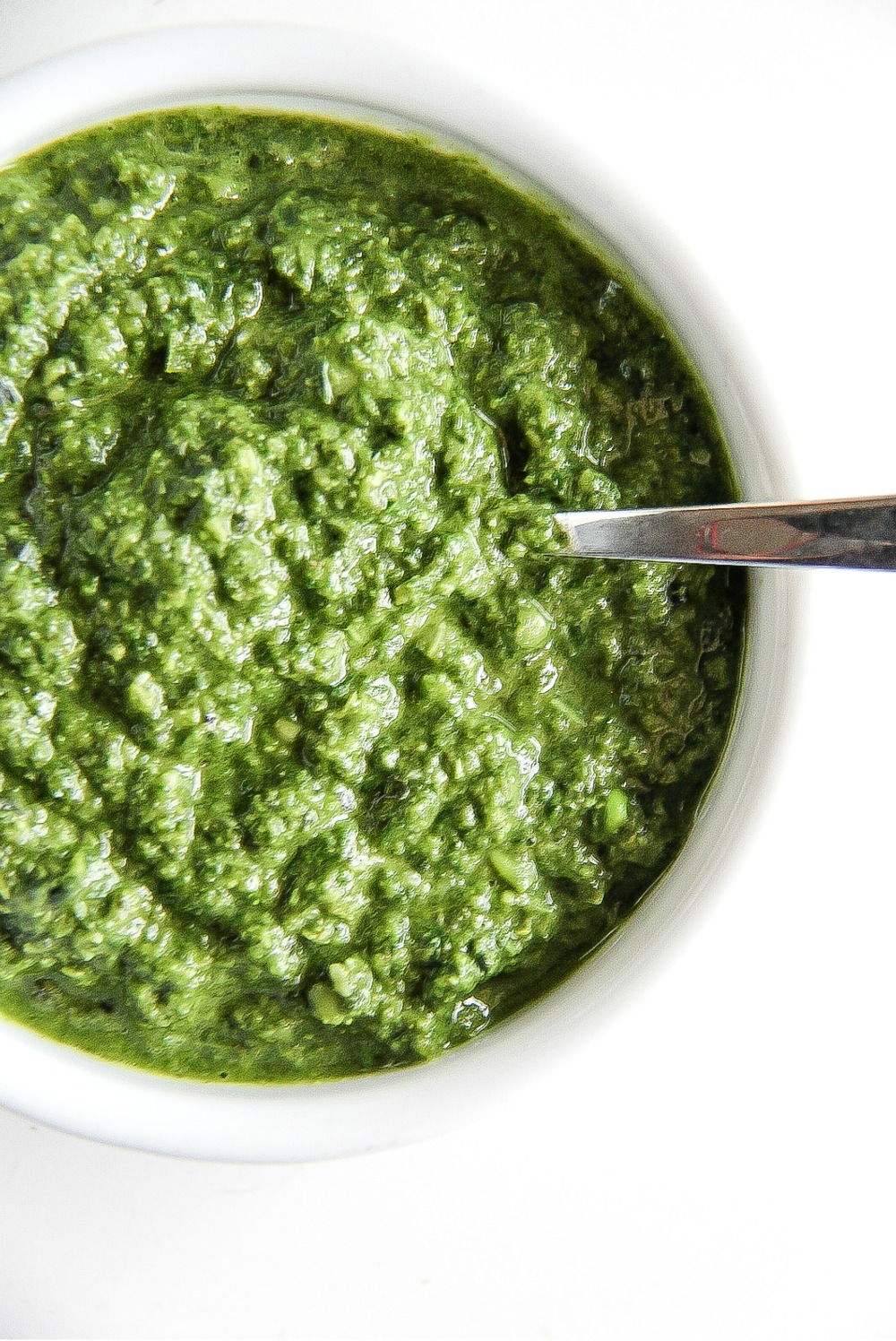 homemade green pesto in a serving bowl