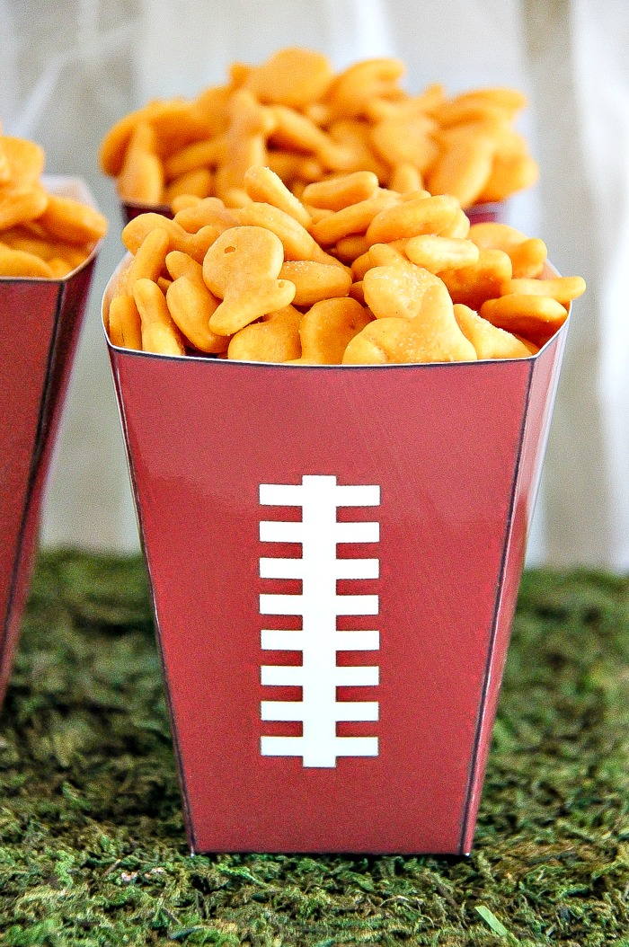 Goldfish crackers in a brown and white football snack cup