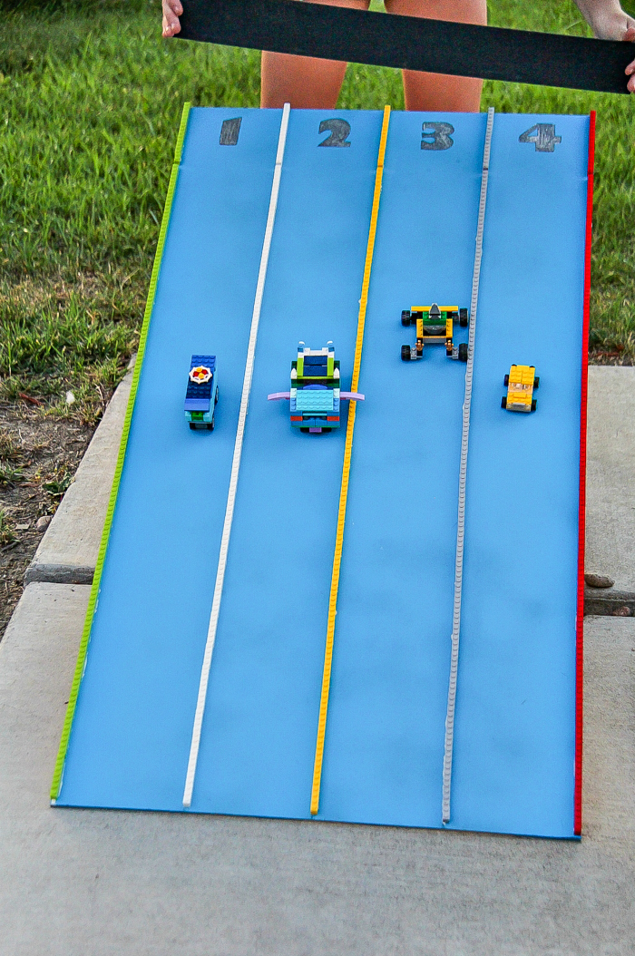 diy lego race track made using plywood and lego bricks