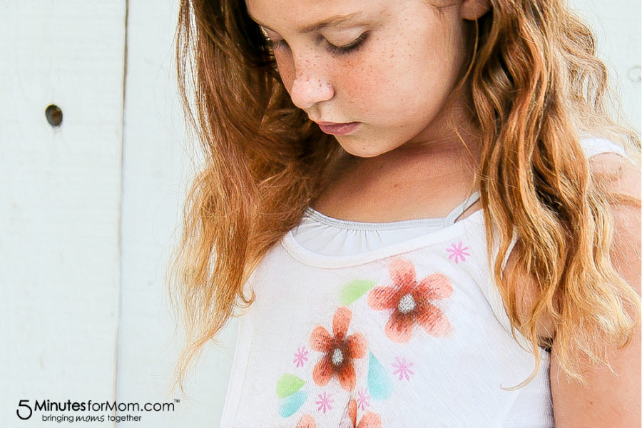 flowers airbrushed onto a white tank