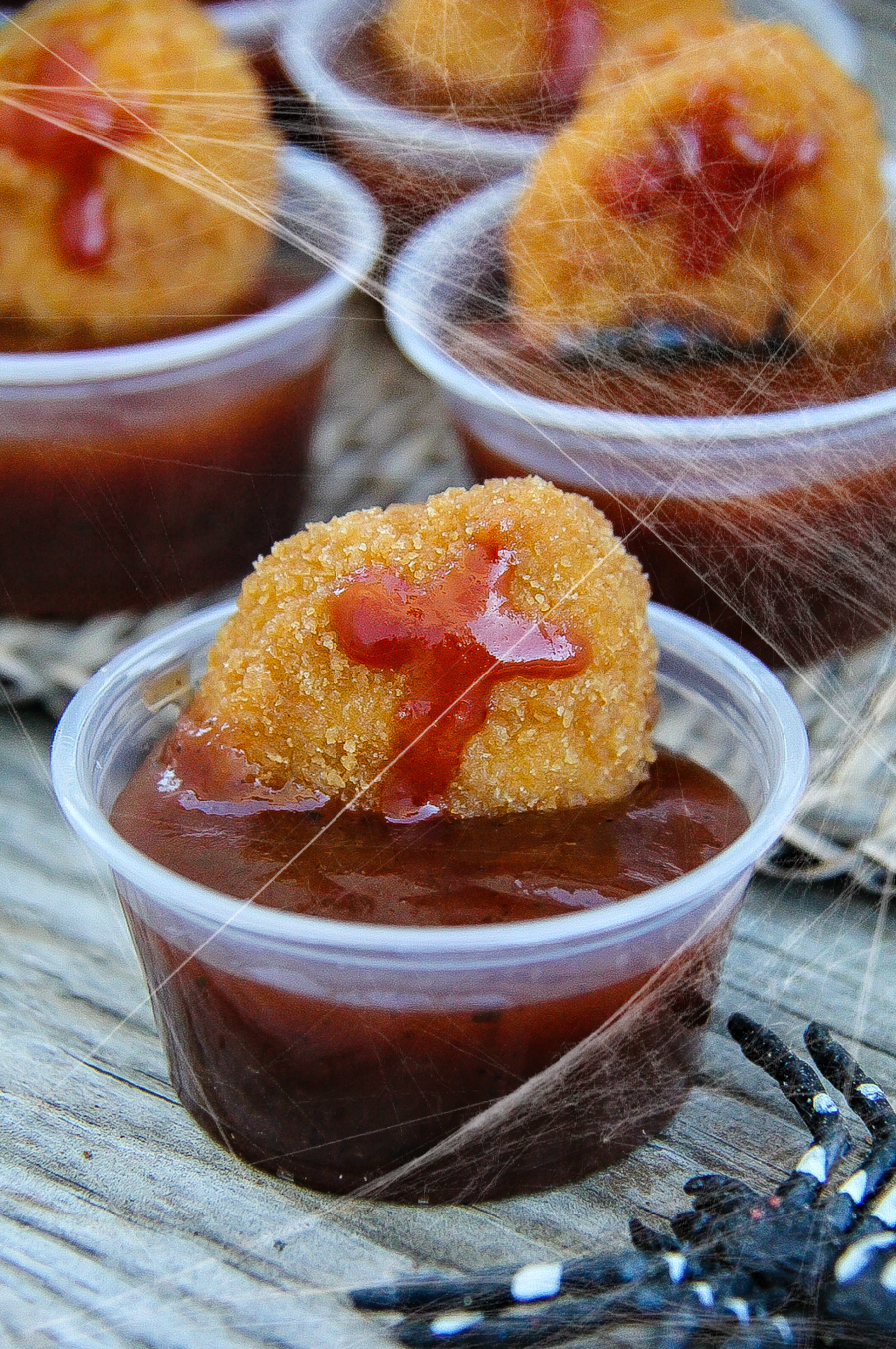 Chicken nuggets in barbecue sauce made to look like a graveyard for Halloween