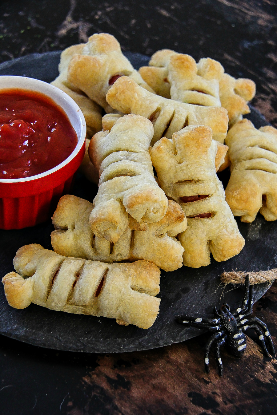 Best Halloween food ideas for parties. Bones made out of Lit'l Smokies and pastry.