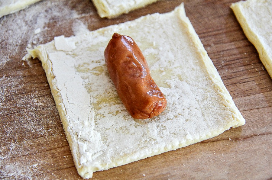 Lit'l smokies being wrapped in pastry