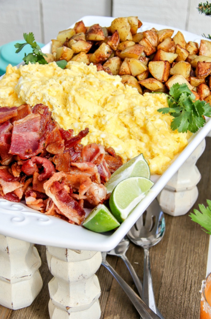 bacon, egg, and potatoes on a serving tray