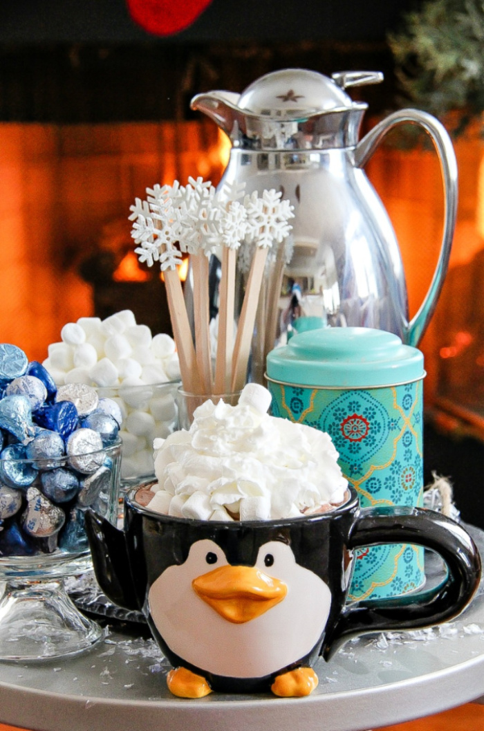 penguin mug filled with hot chocolate and marshmallows