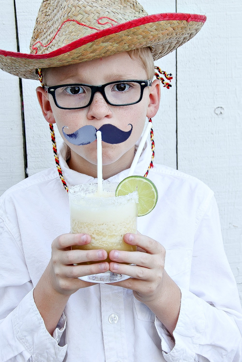pineapple margarita mocktail recipe with a bendy mustache straw