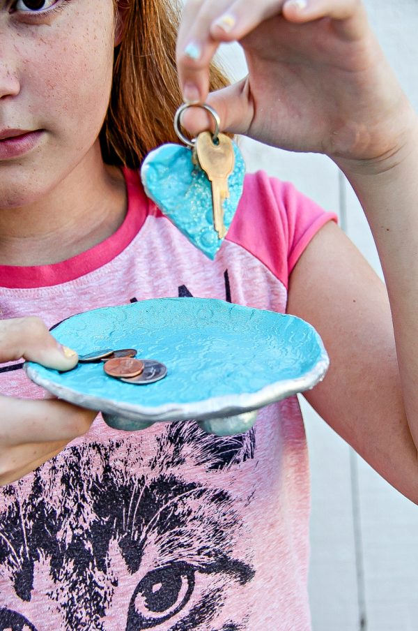 a handmade clay keychain and coin dish for fathers day