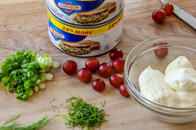 canned chicken with red grapes, green onions, and fresh dill