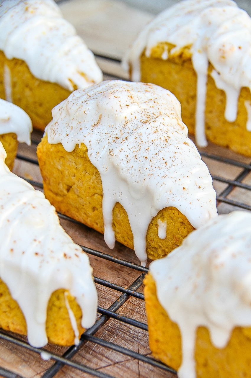 pumpkin scones covered in icing and cinnamon.