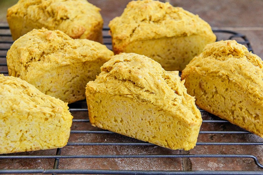 Pumpkin scones cooling on a wire rack.