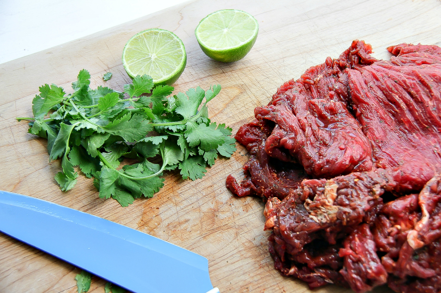 carne asada meat with cilantro and lime